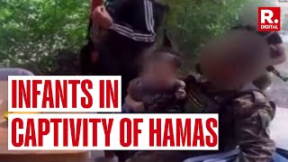 Children held hostages by Hamas Terrorists parents murdered [upl. by Enerak]