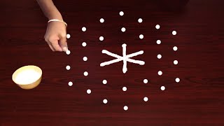 Easy Rangoli with 7X4 Dots  Simple rangoli use dots amp lines telugu muggulu  Rangoli Latest Designs [upl. by Wesley]