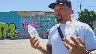 Downtown Los Angeles Skid row giving out water its hot americafirst homelesscrisis [upl. by Mick]