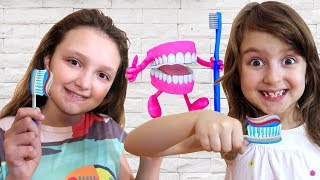 Kids plaing with Doctor Drill Play Doh Teeth Dentist playset [upl. by Yentrok]