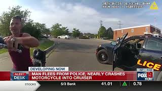 Motorcycle crashes into police car during chase [upl. by Eimyaj]