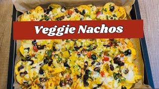 So tired to cook Try this easy amp quick nachos recipe  Vegetarian Nachos  cheesynachos baked [upl. by Ahsinotna721]