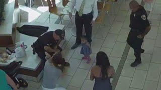 Surveillance video shows 2 officers saving choking baby [upl. by Elacsap]