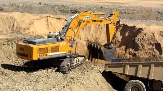 Liebherr R974C vs Caterpillar 775F [upl. by Nohsav840]