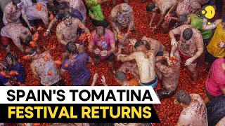 Revellers paint the town red in Spains annual quotTomatinaquot festival l WION ORIGINALS [upl. by Nosle]