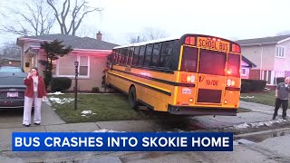 School bus crash badly damages home but no injuries reported [upl. by Simmie439]