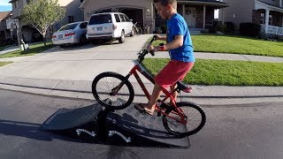 😱 KID GOES OFF BIKE JUMP [upl. by Meelas]