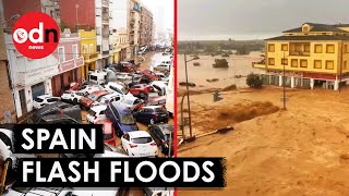 Terrifying Footage Shows Flash Floods in Spain Sweep Away Walls and Cars [upl. by Elik]