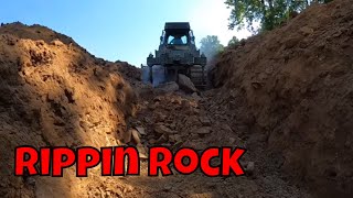 Ripping rock and hard dirt on the lake job with the 850j dozer and HX210Al excavator [upl. by Griffis]