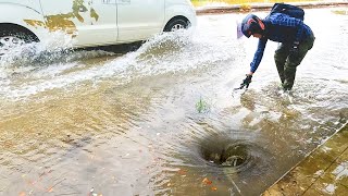 Unclogging Storm Drains to Clear Roads Unclogging to Save Flooded Roads [upl. by Pump]