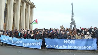 Des milliers de manifestants rassemblés à Paris contre la loi immigration  AFP Images [upl. by Niltag]