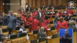 ‘Racist Pay back the money’  Scuffle breaks out in parliament between DA and EFF [upl. by Idnahk597]