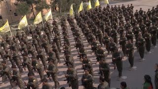 SDF forces parade during a ceremony announcing their victory over IS [upl. by Gerard]