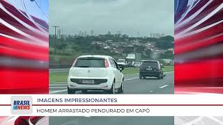 IMAGENS IMPRESSIONANTES HOMEM ARRASTADO PENDURADO EM CAPÔ [upl. by Clary771]