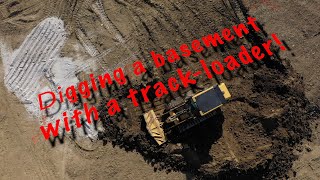 Digging a basement with a trackloader [upl. by Leamsi]