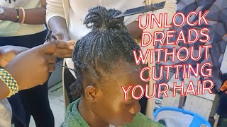 HOW TO UNDO TEMPORARY DREADLOCKS WITHOUT CUTTING YOUR HAIR TUTORIALDIY [upl. by Oicnecserc294]