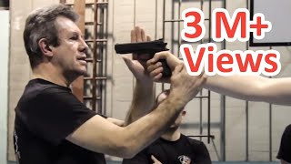 KRAV MAGA TRAINING • The Fastest gun disarm Tutorial [upl. by Reisinger]