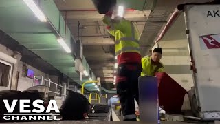 Baggage handlers filmed throwing passengers luggage onto a conveyor belt [upl. by Ahc]