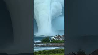 Waterspout behind village waterspout terribletornado tornadousa [upl. by Dido]