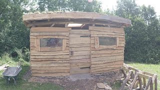 Roundwood timber framed shed part 10 cladding and door [upl. by Nyasuh]