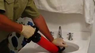 How To Clear A Blocked Sink [upl. by Einnob55]