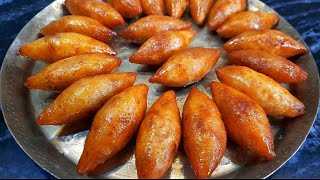 Mug Puli Pitha  সেরা স্বাদের মুগ পুলি পিঠা রেসিপি  Bengali Pithe Puli Recipe  Moong Shamli Pitha [upl. by Nwahsram]