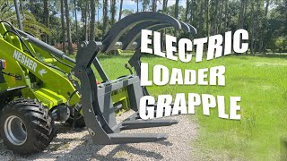 NESHER electric loader with grapple attachment [upl. by Gustavus]