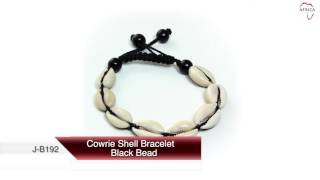 Cowrie shell bracelet black bead from Africa Imports [upl. by Ahsikit8]