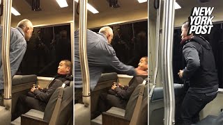 Bigot attacks Asian passenger on train while horrified commuters watch  New York Post [upl. by Eissak]