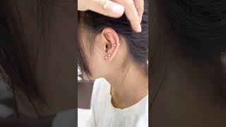 helix piercing with gun painless piercingNosepiercing youtubeshorts viral nosepiercing shorts [upl. by Bibbye438]