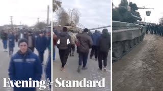 Ukraine Incredible moment unarmed civilians block Russian tank from entering their village [upl. by Eanerb272]