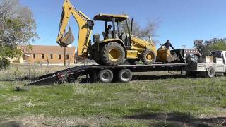 How To Load A Backhoe [upl. by Annirak148]