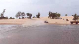 Water Skimming with a 2009 Polaris RZR S at the Silver Lake Sand Dunes hydroplaning utv atv quad [upl. by Ahsas]