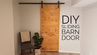 Easy DIY Sliding Barn Door [upl. by Enilhtak795]