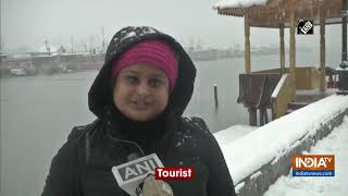 Continuous snowfall disrupts lives of Srinagar people brings joy to tourists [upl. by Fitalludba]