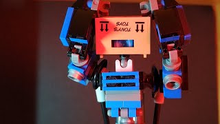 Blue finds a new alt mode Part 1 Lego Transformer Stop Motion [upl. by Ellainad711]