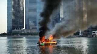 Boat on fire in Marina Bay [upl. by Vanni]