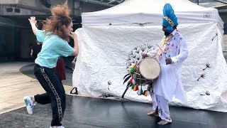 Freestyle Dancing to the Dhol Beat of Ustaad Ravi Kumar Ji  Vancouvers Robson Square [upl. by Eannej]