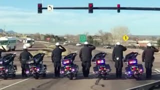 Police officers salute soldiers returning home from Afghanistan [upl. by Kciwdahc]