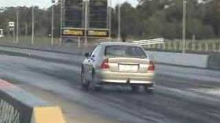 Mitsubishi Magna with no pipes Drag Racing  Heathcote Park Raceway [upl. by Norok]