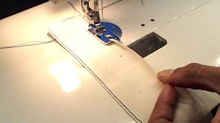 How to Use a Roll Hemmer Presser Foot  FashionMadeLive [upl. by Ellison483]