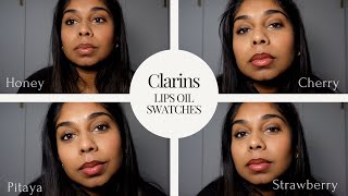 Clarins Lip Comfort Oil Swatches on Tan Skin  Honey Cherry Pitaya and Strawberry [upl. by Dawkins163]