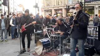 Street band FunFiction outside Oxford Circus stn London  singing Rolling Stones Under My Thumb [upl. by Ahsienauq]