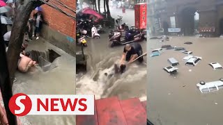 Heavy rainfall kills at least 12 in Chinas Zhengzhou [upl. by Joletta]