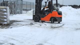 Snow chains on a forklift [upl. by Sikata]