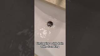 Bathroom sink draining slowly You may be able to unclog it easily without a machine [upl. by Erdnassac680]