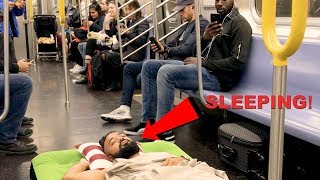 Man Takes A Nap On Air Bed NYC Subway [upl. by Annabella489]