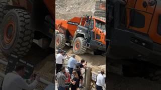 Develon DA30 dump truck showing its mastery of rough and uneven ground to the crowds [upl. by Gibbie]