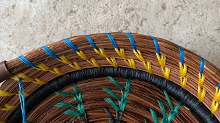 Split stitch for pine needle baskets using sinew [upl. by Araiek]