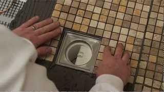 Wet room installation video  Tiling the former and waste [upl. by Forester]